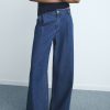 Wide-leg pleated jeans