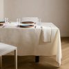 Resin-coated 100% linen tablecloth with contrasting overlock for 8 to 10 diners