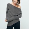 Asymmetrical sweater with metallic detail