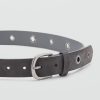 Belt with metal eyelets