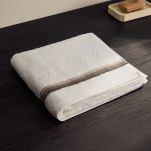 Washbasin towel with striped trim