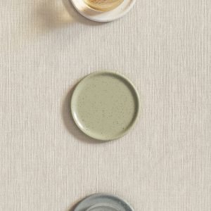 Stoneware coasters with spots