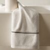 Cotton hand towel with embroidered scalloped edge