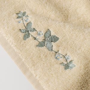 Guest towel with embroidered flower