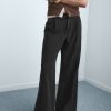 Wide-leg pleated jeans