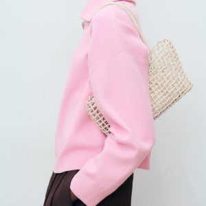 Knitted sweater with zip collar