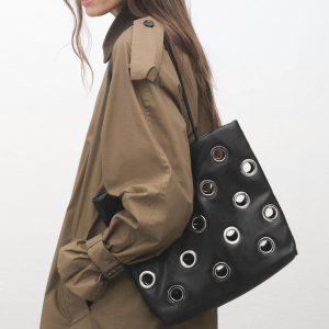 Shoulder bag with eyelets