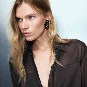 Semi-transparent blouse with patches