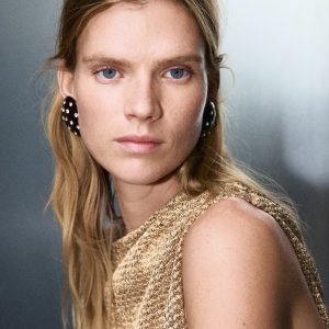 Asymmetric sequin top