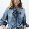Denim shirt with bow