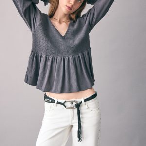 Low-waist studded jeans