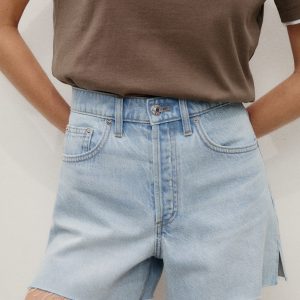 Denim shorts with frayed hem
