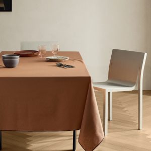 Resin-coated cotton tablecloth with overlock stitching for 8 to 10 diners