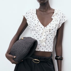 Polka-dot blouse with ruffles