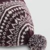 Bobble hat with jacquard pattern