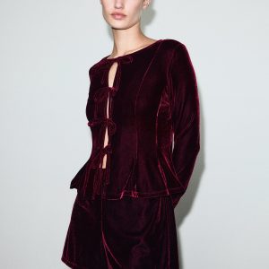 Velvet blouse with bows