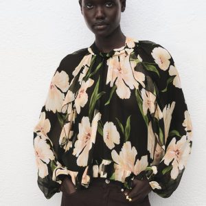 Semi-transparent floral blouse