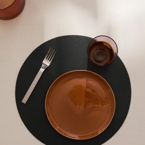 Round leather-effect placemat