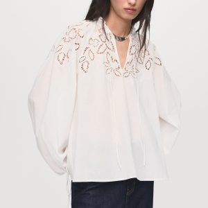 Embroidered blouse with bows