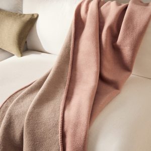 Soft fleece blanket with saddle-stitch detail