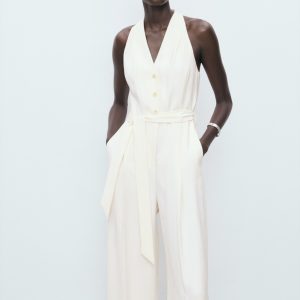 Halter-neck jumpsuit with belt