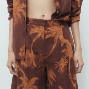 Cotton bermuda shorts with palm-tree print