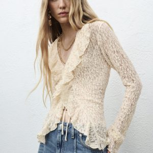 Lace blouse with ruffles