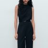 Long jumpsuit with draped neck and belt