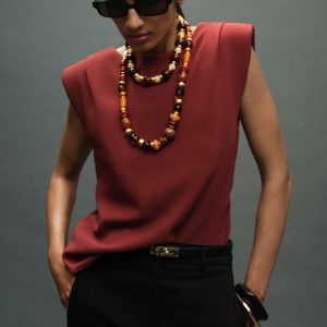 Ruched blouse with shoulder pads