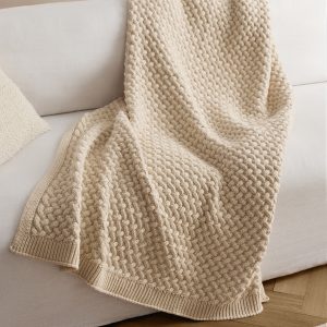 Knitted interwoven blanket
