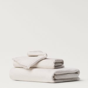 Hand towel with waffle trim and fringe