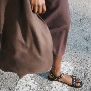 Strap sandals with buckles and eyelet details