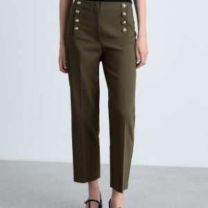 Straight pants with jewel buttons