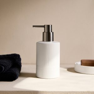 Stoneware soap dispenser with relief
