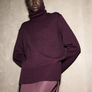 Turtleneck sweater with slits
