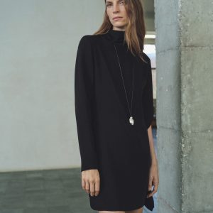 Turtleneck dress with asymmetrical sleeves